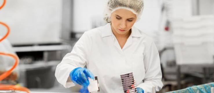 Woman working in food factory