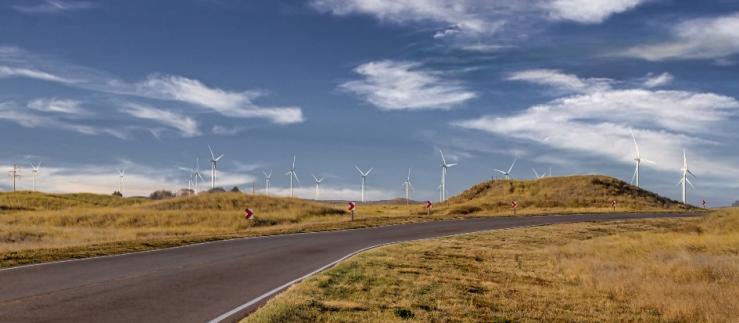 Wind turbines along a road in Chubut, Argentina