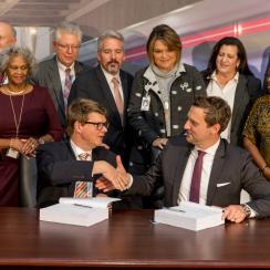 Metropolitan Atlanta Rapid Transit Authority (MARTA) CEO Jeffrey Parker and Stadler US Inc. CEO Martin Ritter sign the contract to order METRO trains in Atlanta in November 2019, the largest contract for Stadler in the US so far.