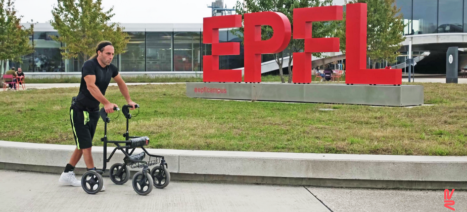 Patient with complete spinal cord injury walking at the EPFL campus after five months rehab. 