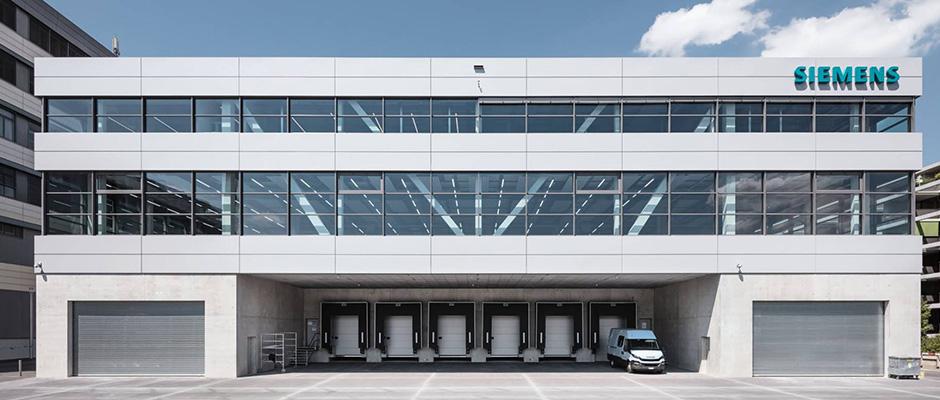 The front side of the new production facility in Zug. Image Credit: Siemens
