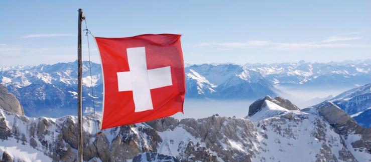 Swiss flag in Swiss Alps