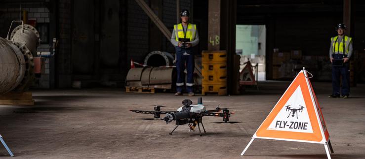 A drone from Voliro performs measurement flights at Holcim's cement plant in Siggenthal.