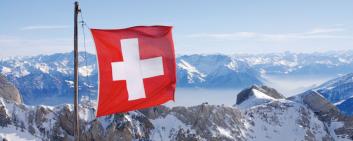 Swiss flag in Swiss Alps